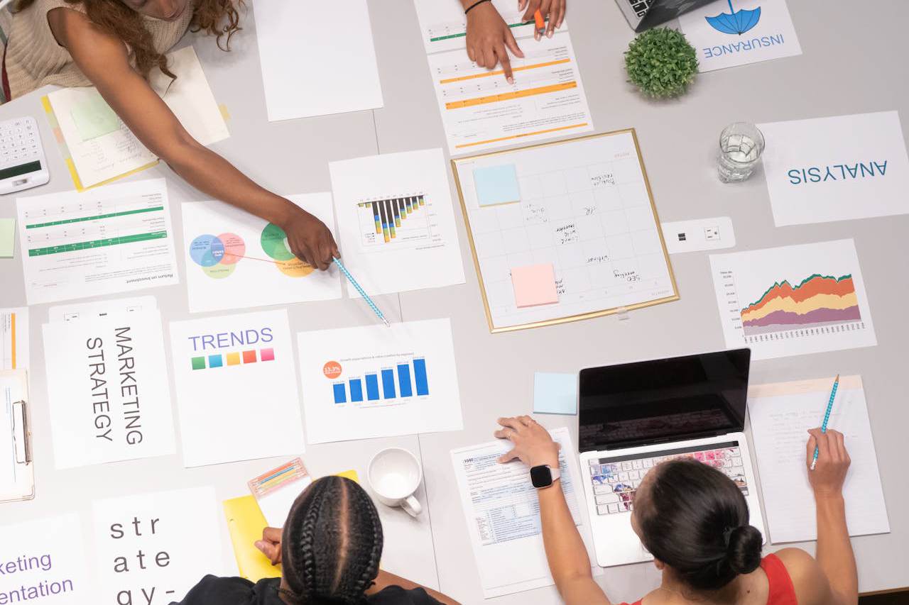 A busy marketing office table